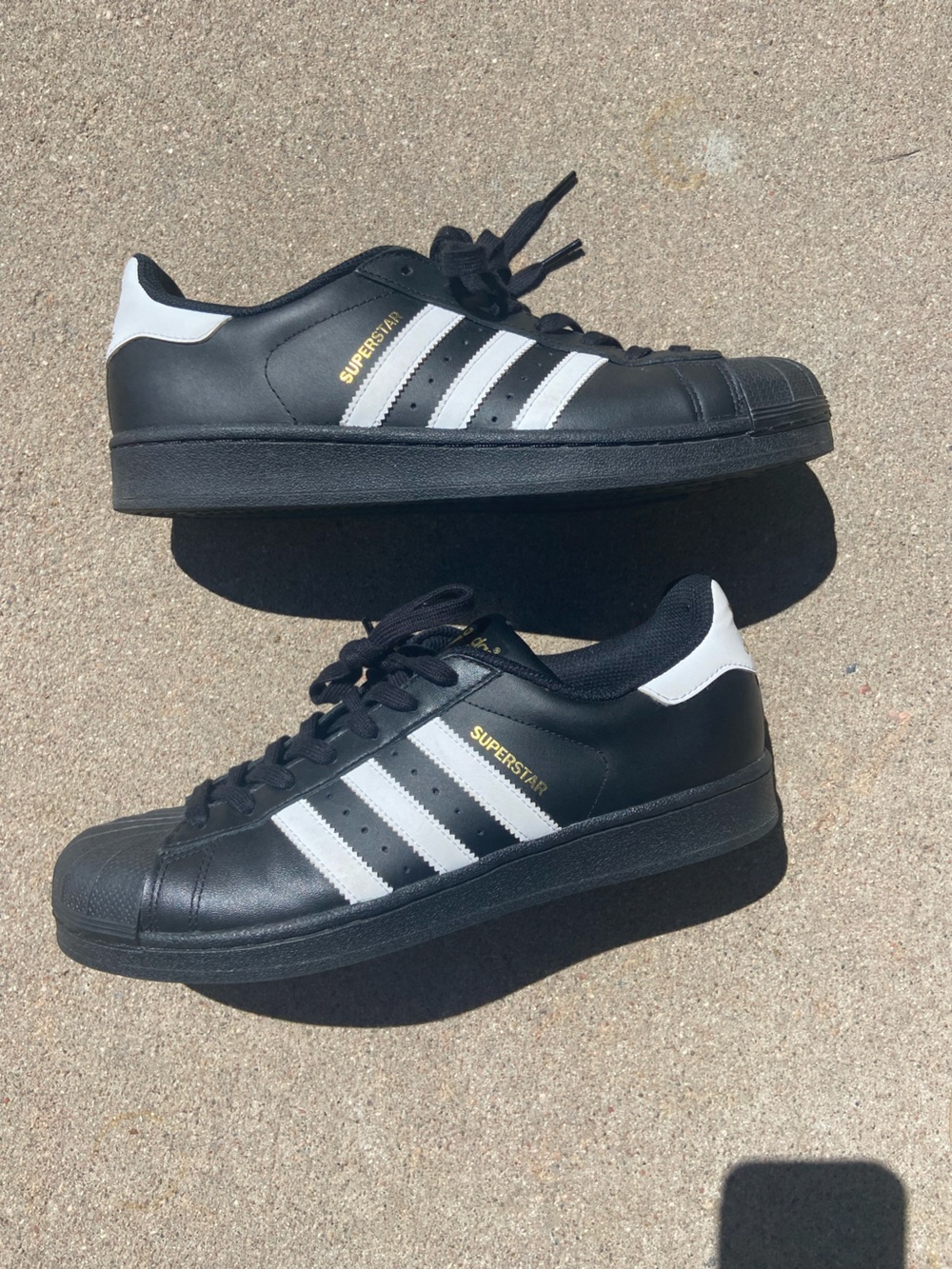adidas Superstar Men's Black and White Leather Sneakers